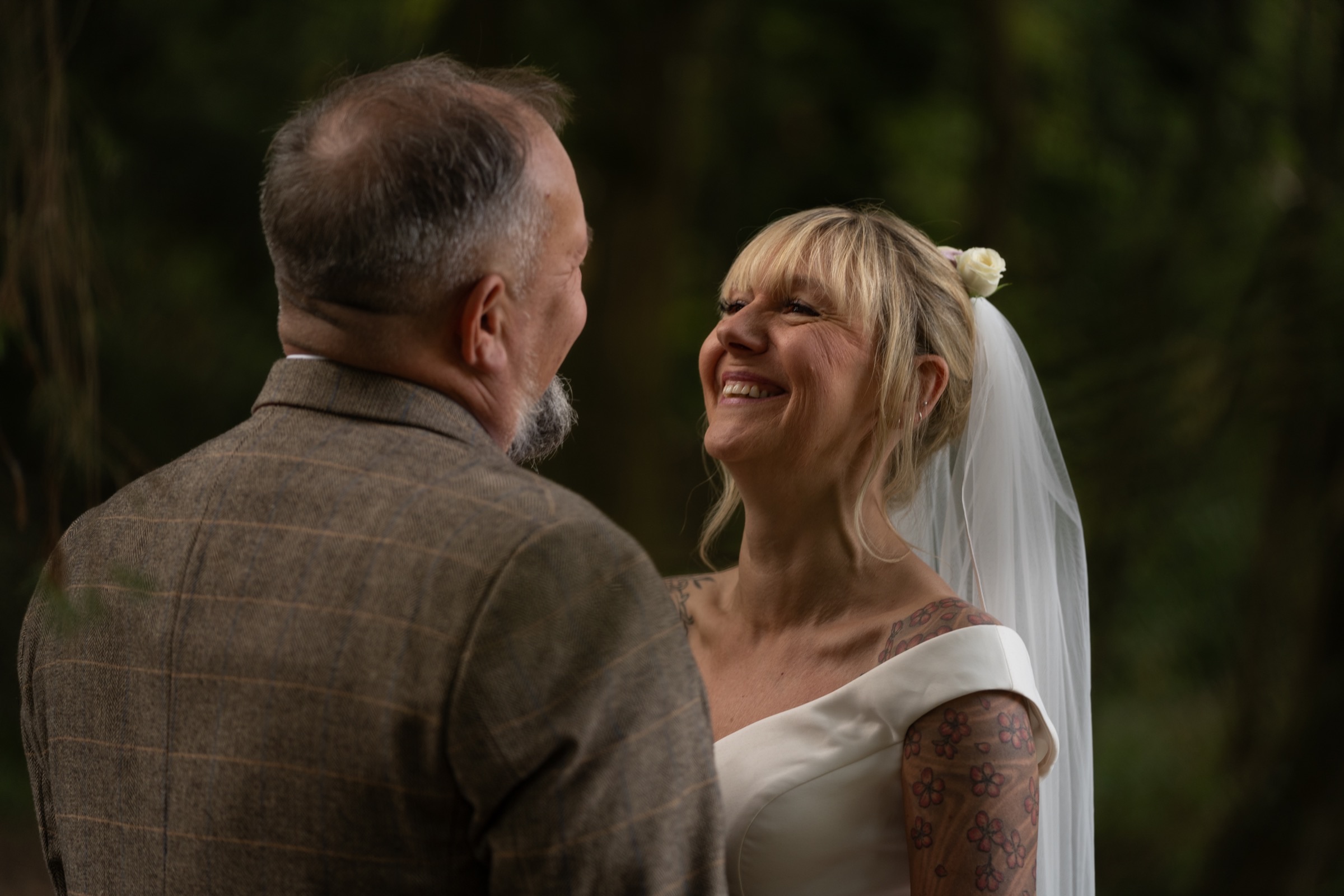 A bride laughing in a genuine, unscripted moment — captured without direction